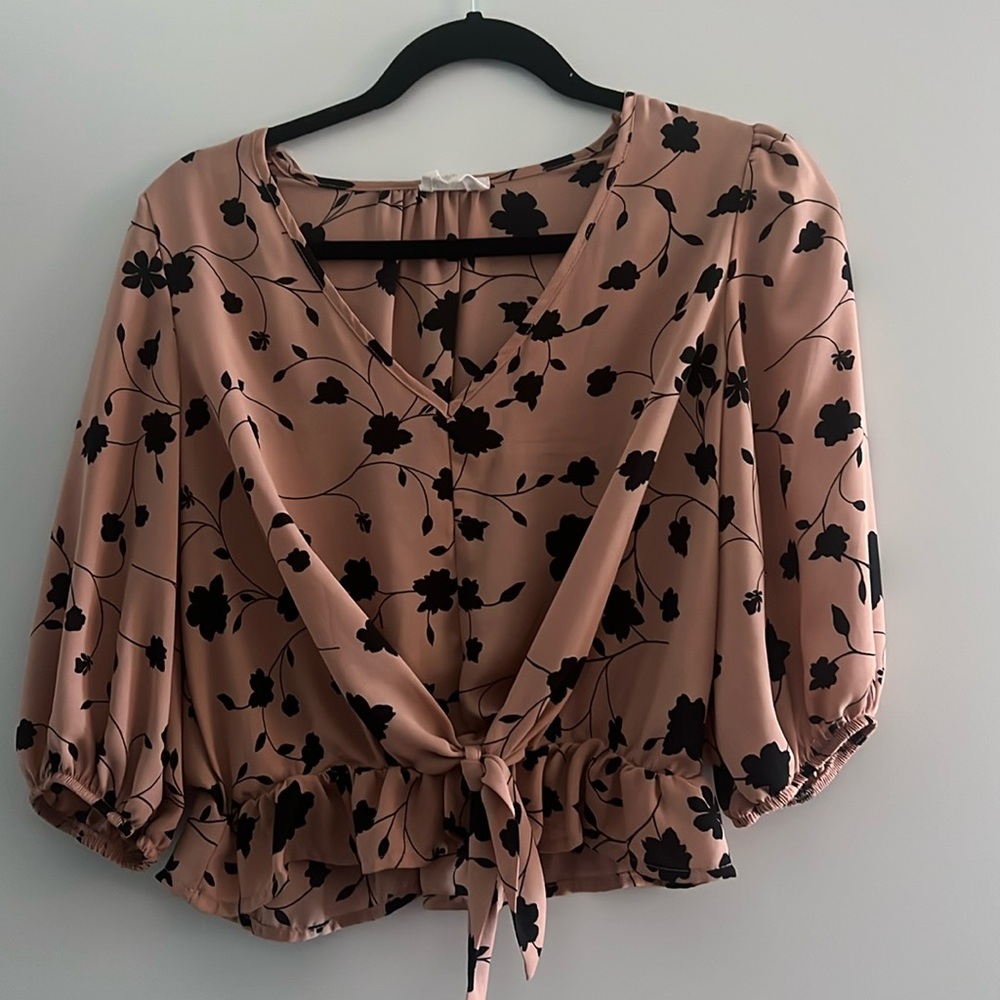 Pink and black floral peplum tie top